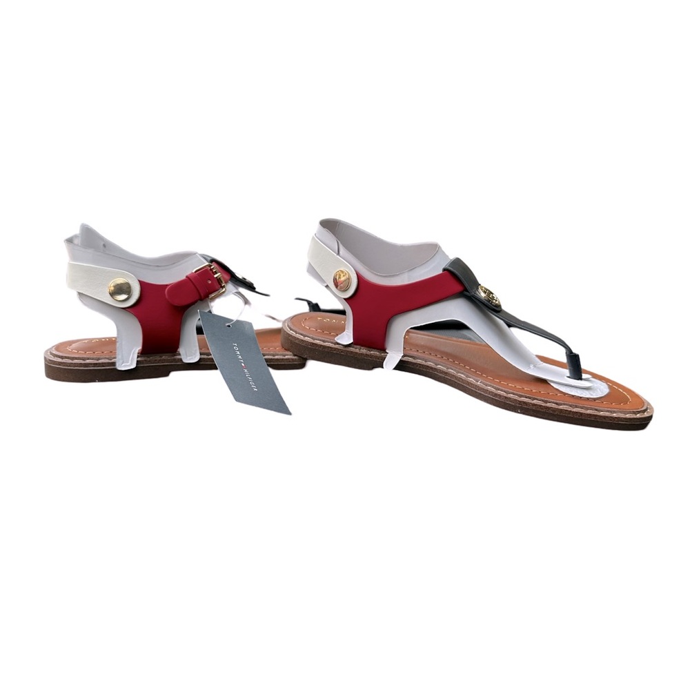 Tommy Hilfiger's sandals secured with a back strap and side buckle.